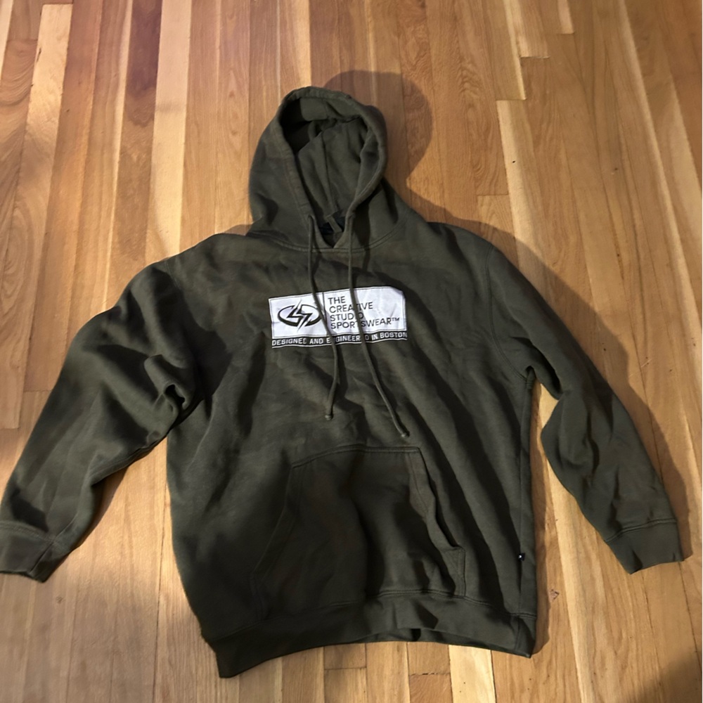 Used Men’s Olive Green Graphic Hoodie with drawstring front pocket Size Large